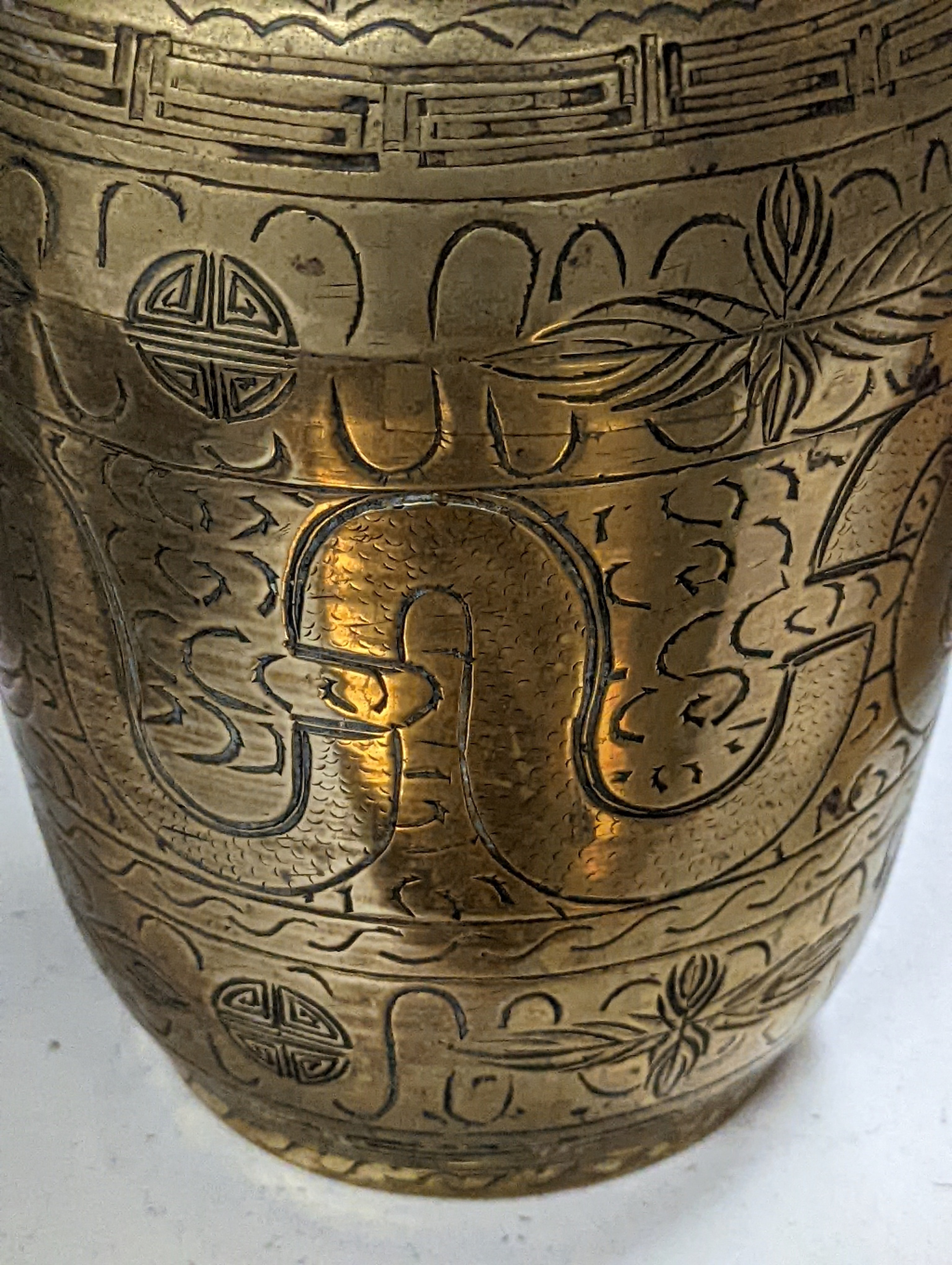 Two early 20th century Chinese bronze vases and a similar tray, 35cm diam.